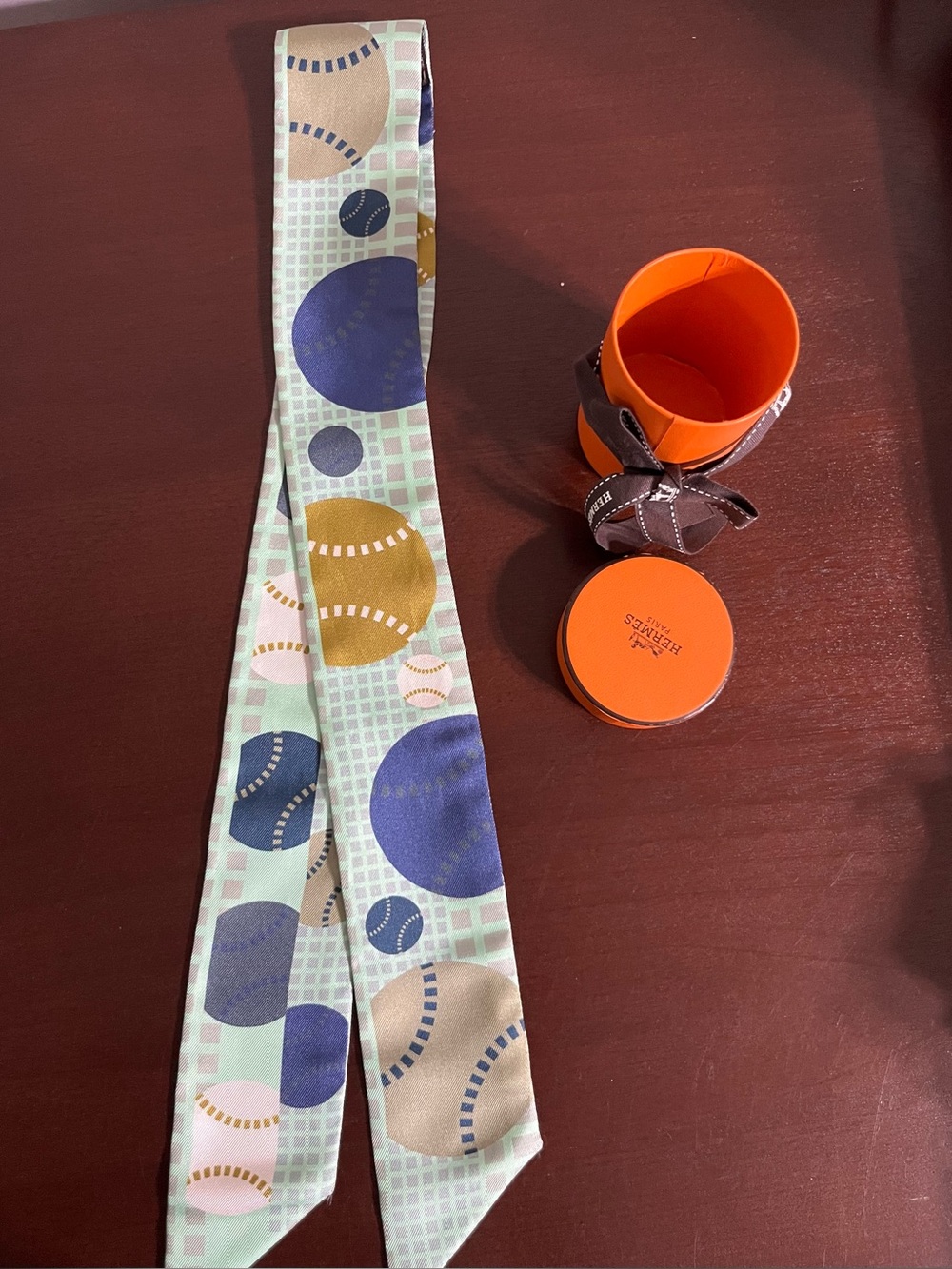 Hermes Twilly Scarf in classic baseball theme